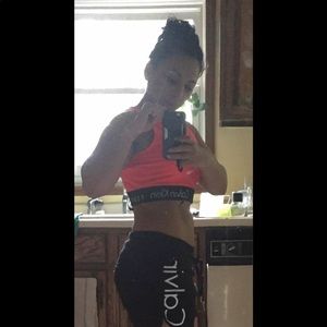 Cropped Calvin Klein workout shirt.